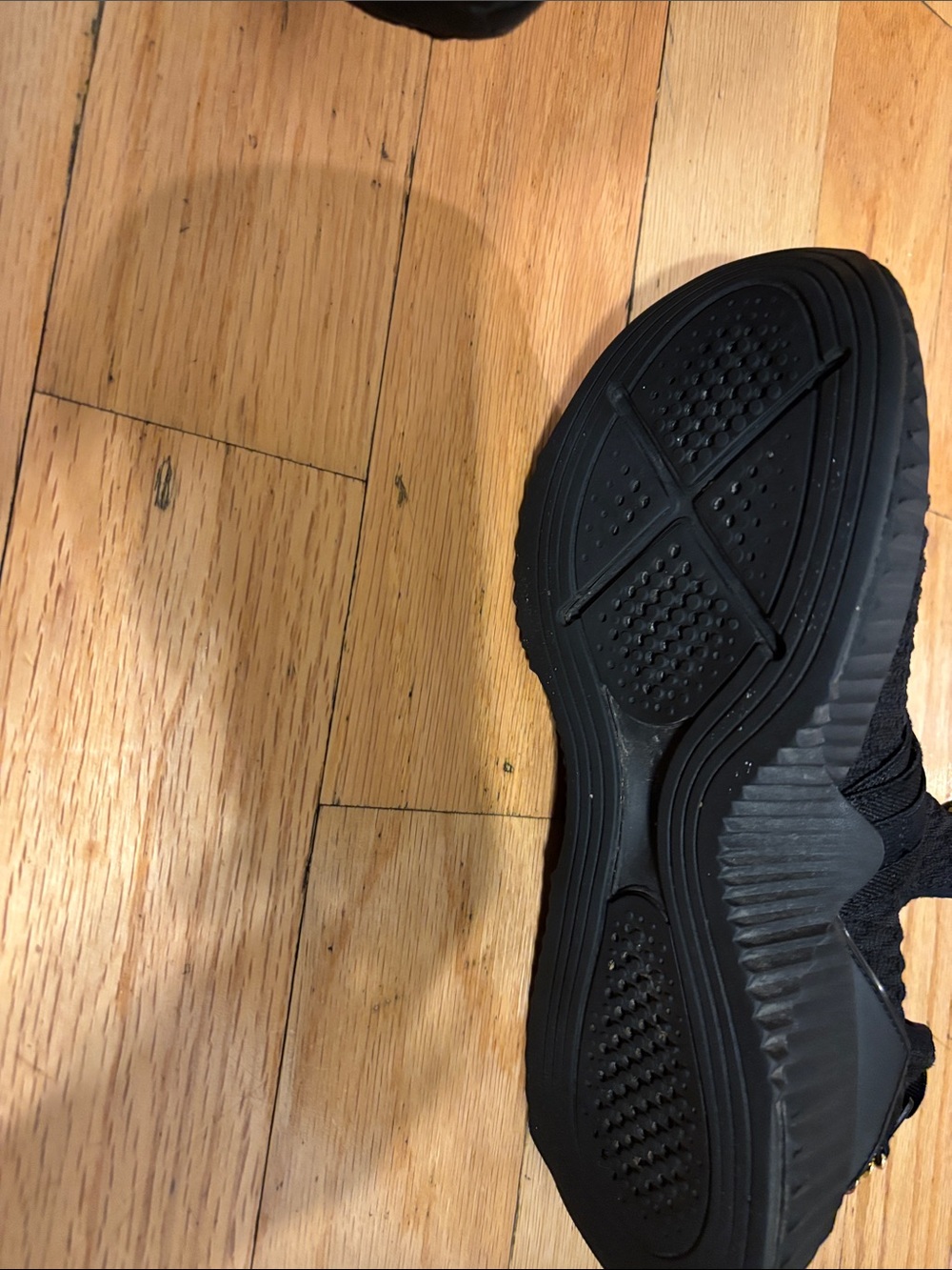 Puma Black Slip-On Knit Sneakers with Gold Hardware - Picture 4 of 5